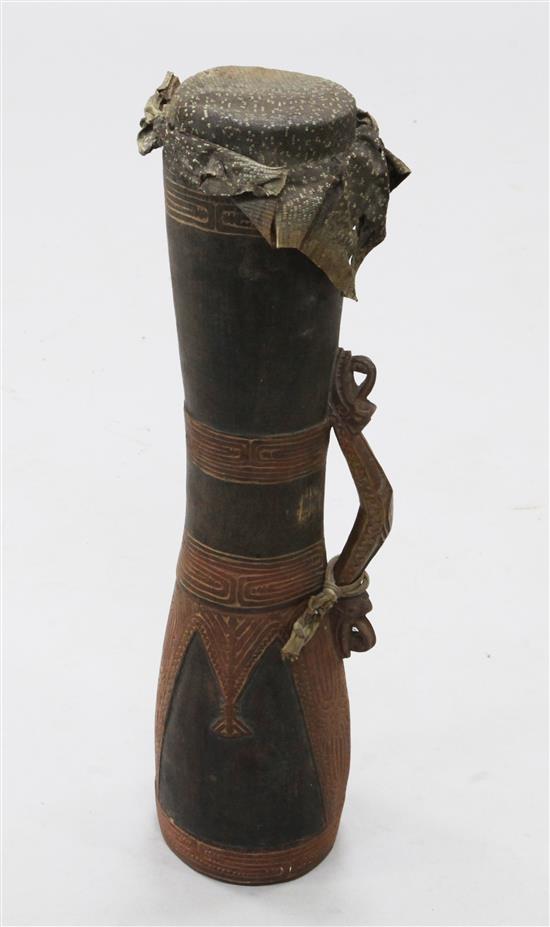 A Papua New Guinea carved wood drum, 22.5in.